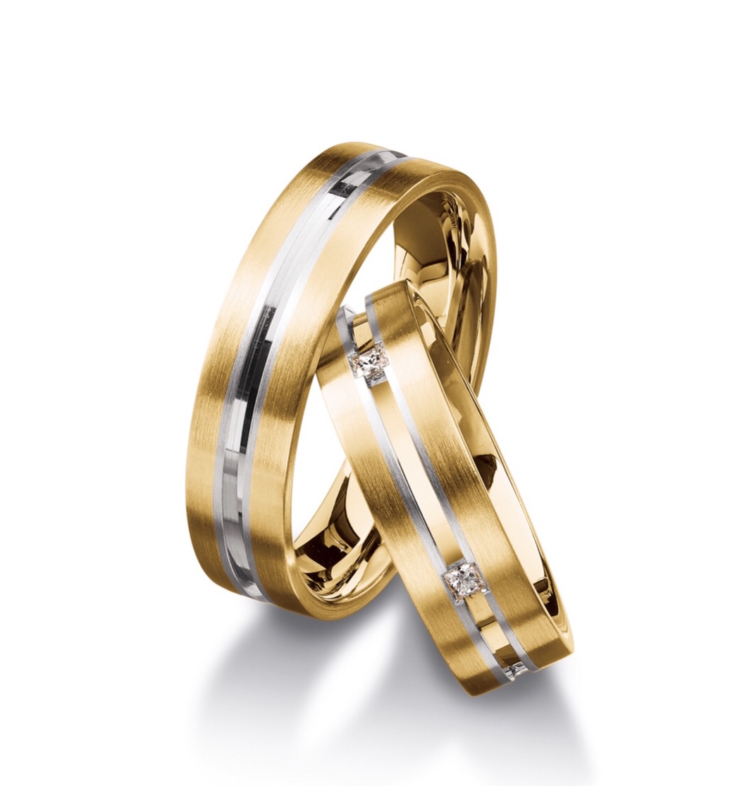 Обручальные кольца с бриллиантами(0,10 ct.) из платины и золота 