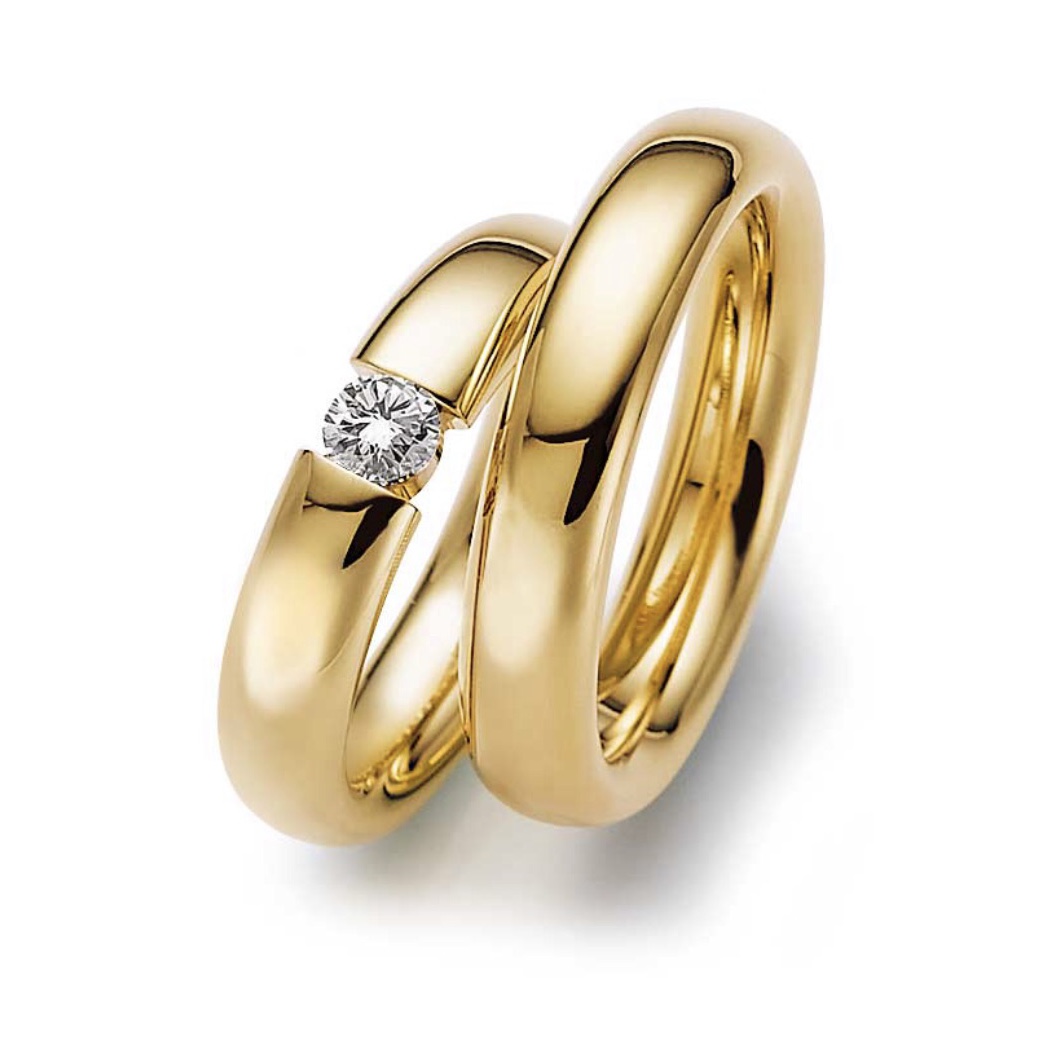 Обручальные кольца с бриллиантом(0,10 ct) из золота