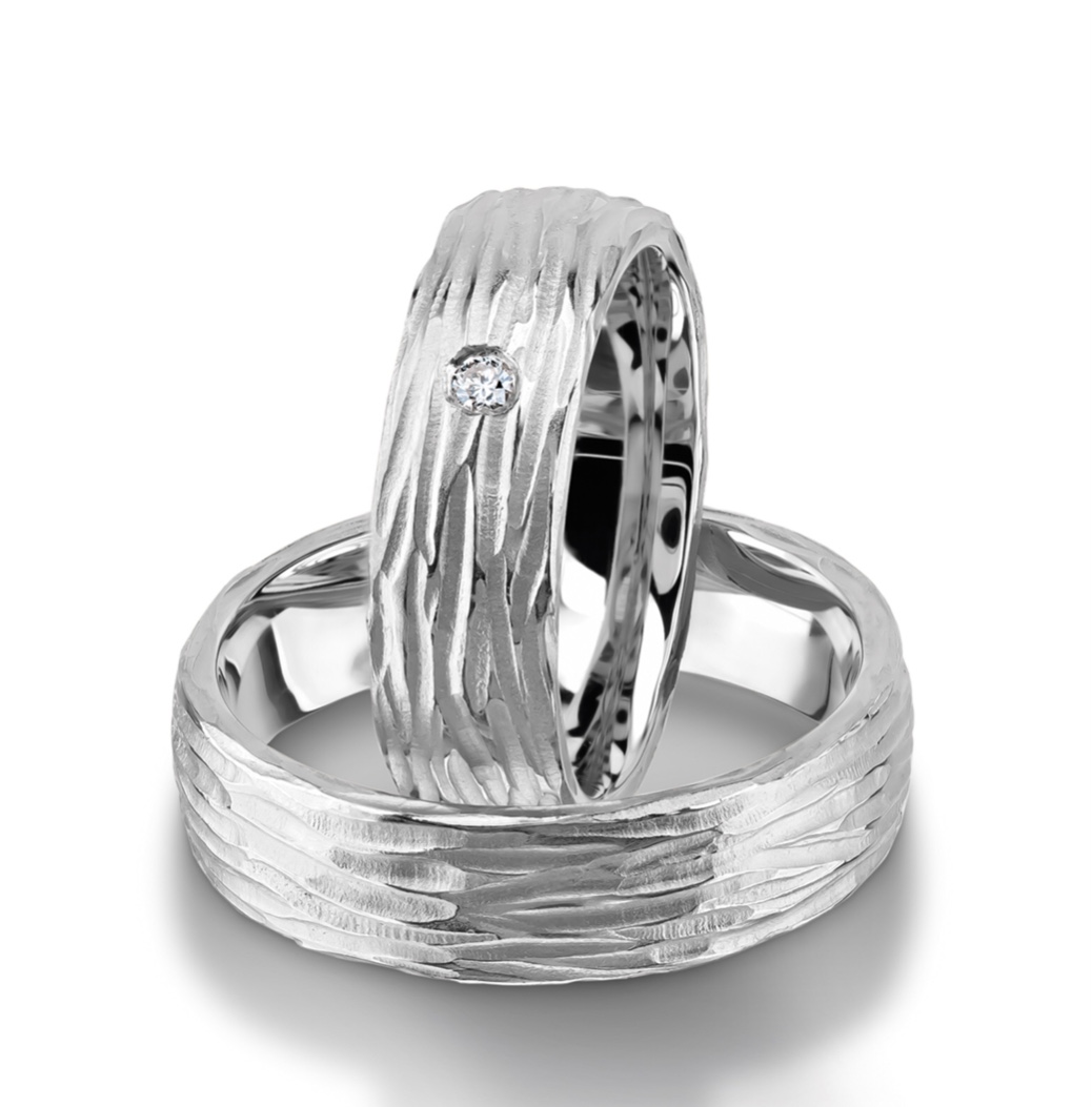 Обручальные кольца с бриллиантом(0,03 ct.) из платины 950 пробы