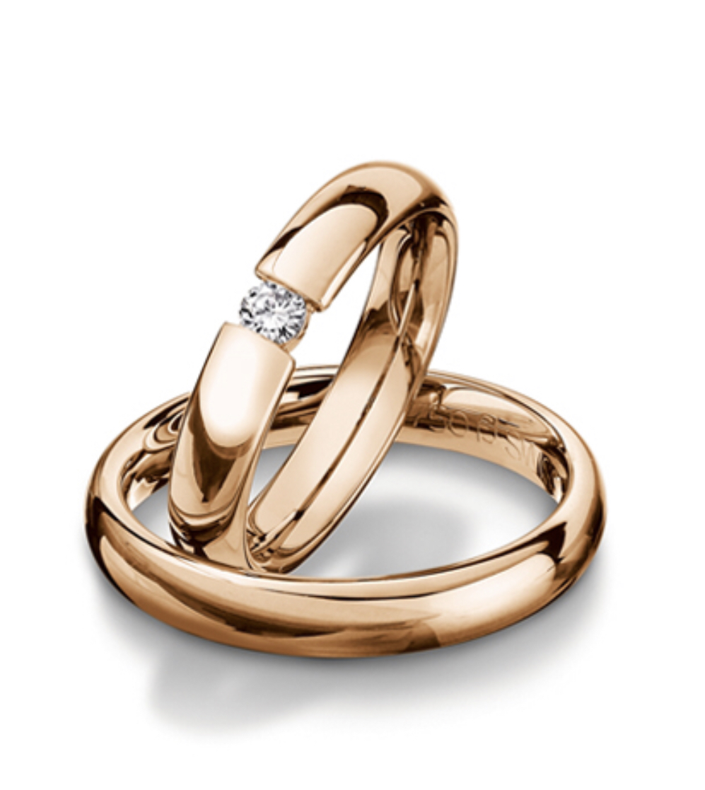Обручальные кольца с бриллиантом(0,10 ct.) из золота 