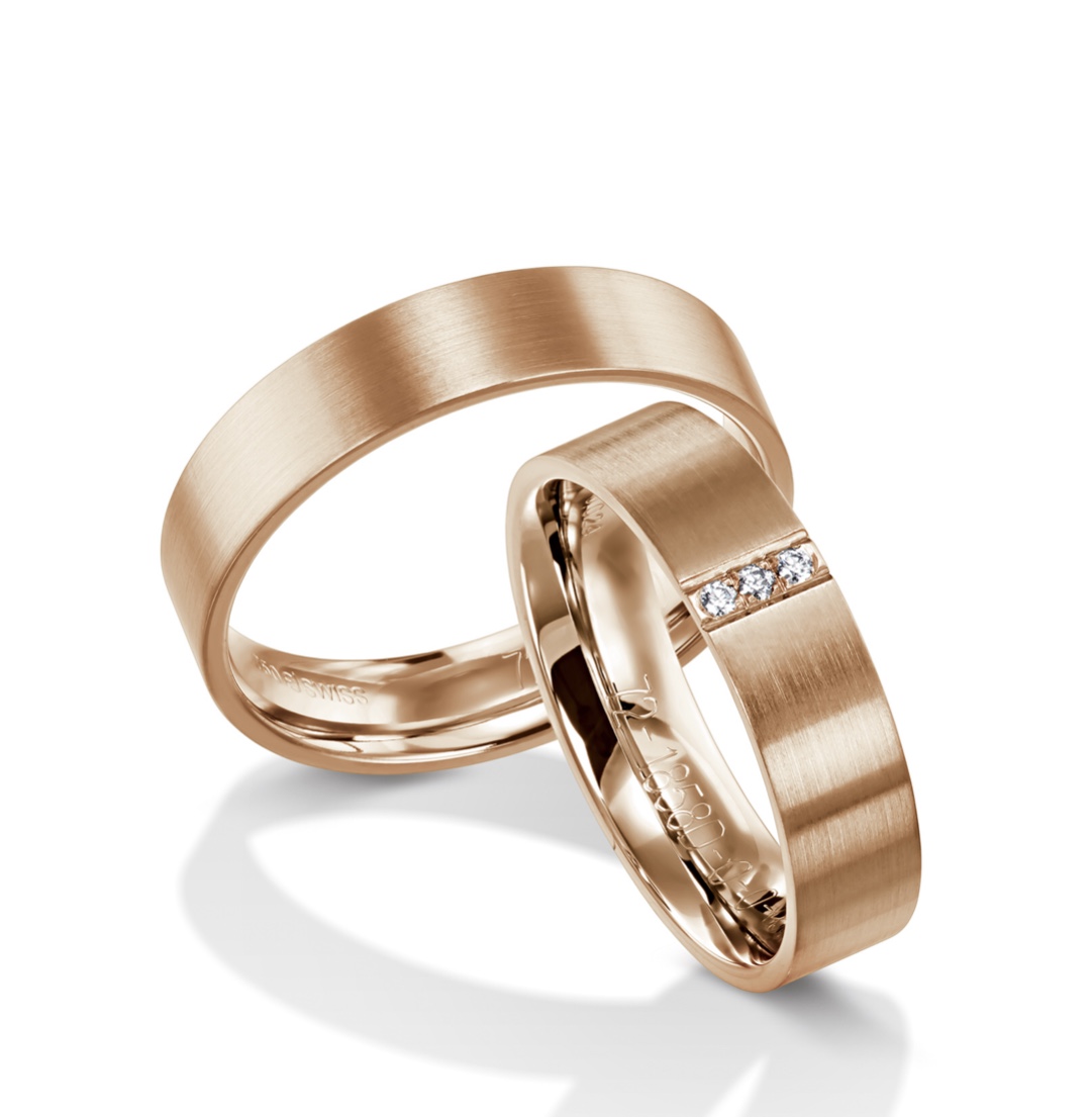 Обручальные кольца с бриллиантами(0,024 ct.) из золота 750 пробы