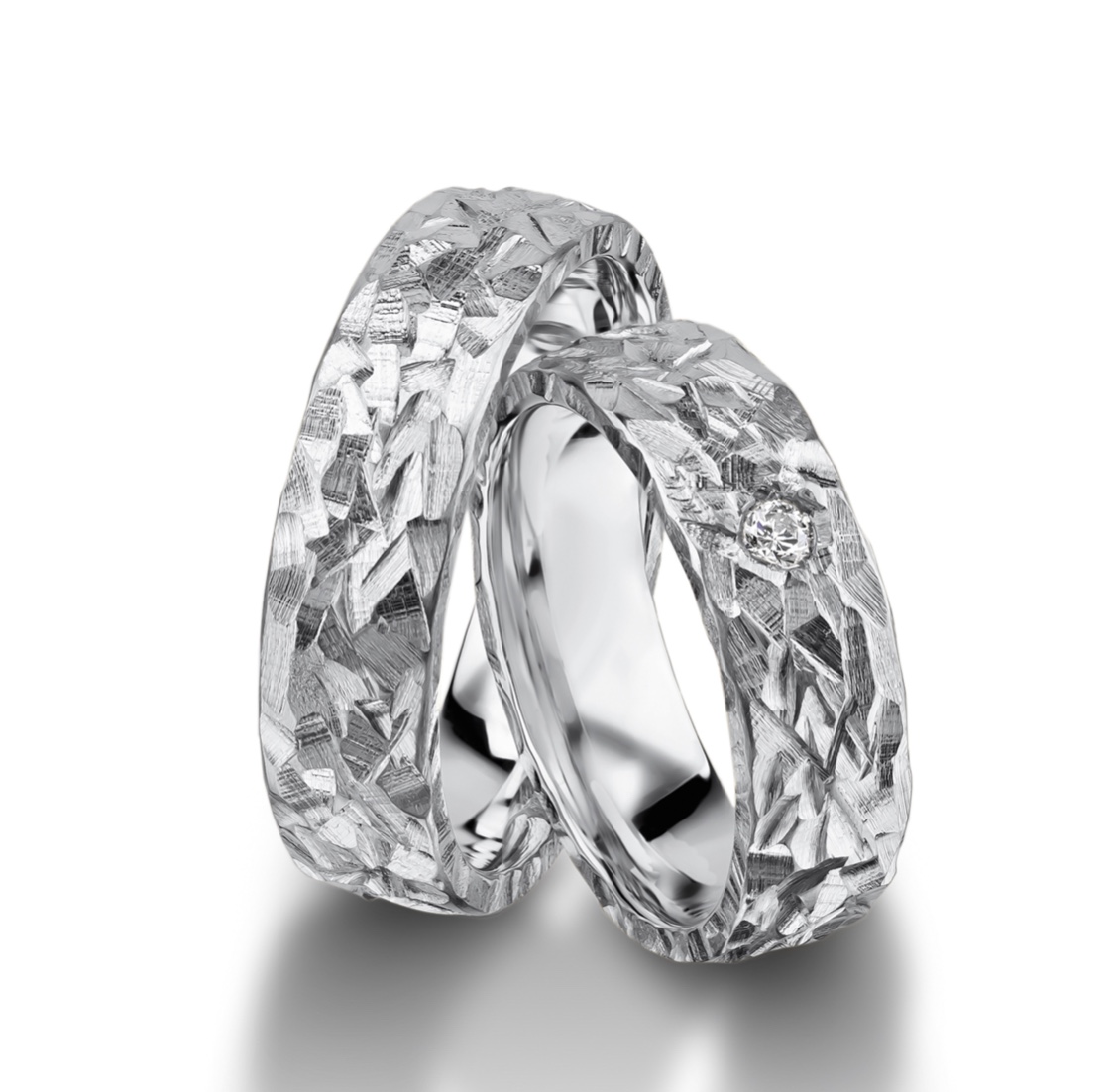Обручальные кольца с бриллиантом(0,013 ct) из платины 