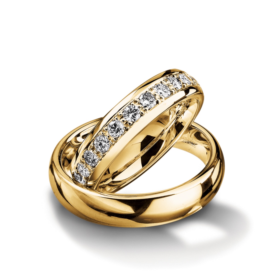 Обручальные кольца с бриллиантами(0,55 ct.) из золота 750 пробы 
